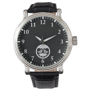 Sparrow facing ten bamboo leaves in a medium circl watch