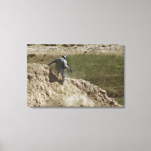 Specialist climbs down canvas print