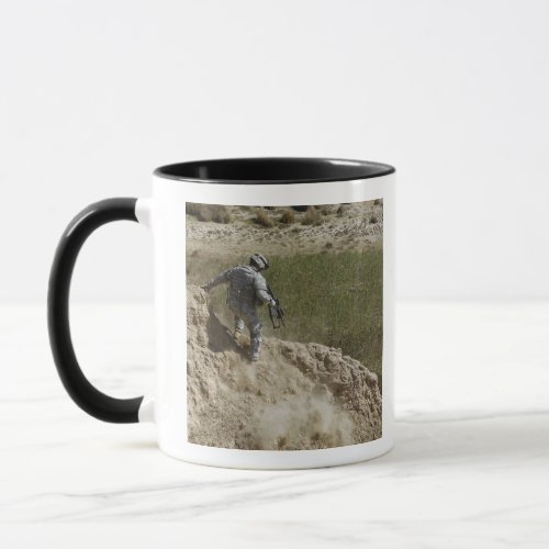 Specialist climbs down mug