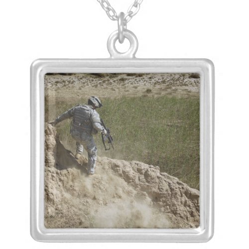 Specialist climbs down silver plated necklace