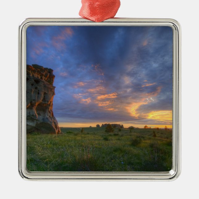 Spectacular sunset skies at Medicine Rocks Metal Ornament (Front)
