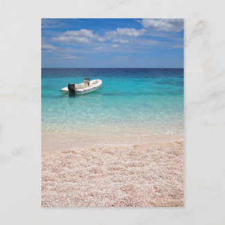 Speedboat in the blue sea postcard