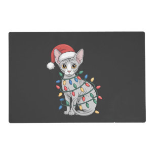 Sphynx Cat Wearing a Santa Hat and Wrapped in Xmas Placemat