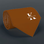 Spice Orange Elegant Monogram   Name | One-Sided Neck Tie<br><div class="desc">An elegant one-sided necktie featuring a bold white monogram across a Spice orangish color background. On top of this monogram sits your first or last name spelled out in all capitals. If you prefer a bolder look for the personal name inside of the large letter you can do the following:...</div>