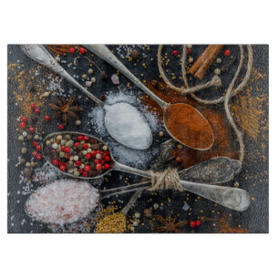 Spices Arranged on Spoons Cutting Board