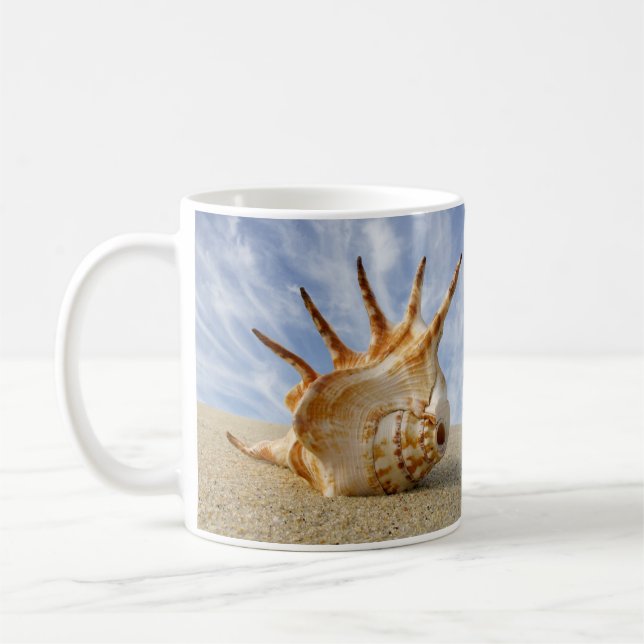 Spider Conch Shell on Sandy Beach Coffee Mug (Left)