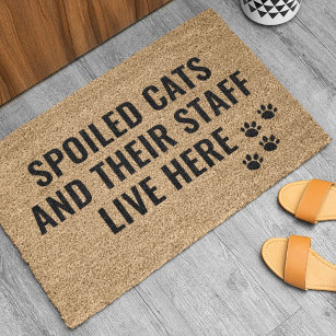 https://rlv.zcache.com/spoiled_cats_and_their_staff_live_here_doormat-r_rsyn1_307.jpg