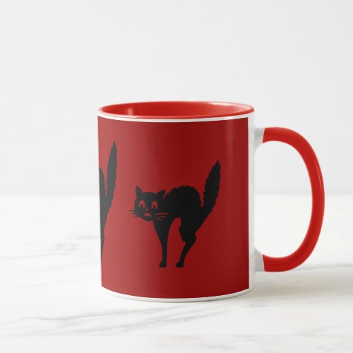 spooky black Halloween cat with arched back Mug