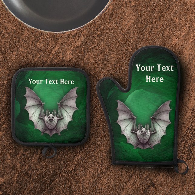 Spooky Gray Flying Bat Glowing Green Cave Oven Mitt & Pot Holder Set (Spooky grey bat wings spread in flight glowing green cave with trees on oven mitt and potholder.)