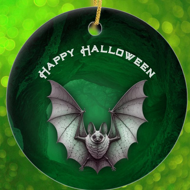 Spooky Grey Bat in Flight Green Haunted Cave Ceramic Ornament (Spooky grey bat flying out of haunted glowing green cave on Halloween ceramic ornament.)