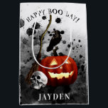 Spooky Halloween Birthday Pumpkin Crow Skull  Medium Gift Bag<br><div class="desc">This spooky Halloween gift bag is perfect for a Halloween birthday party. This gift bag for Halloween birthday party features black splotched ink background with a jack o'lantern,  human skull,  black crow,  and a witches broom. Personalize with the name of your choice.</div>