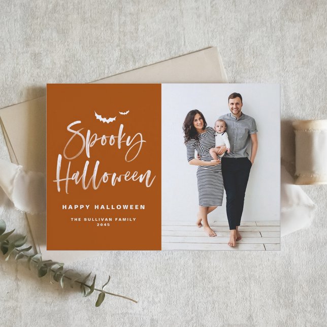 Spooky Halloween Brush Lettering Orange Photo Holiday Card (Share spooky vibes with a photo card featuring white brush lettering on burnt orange background.)