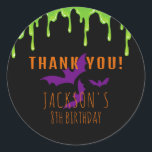 Spooky Halloween Kids Birthday Thank You Classic Round Sticker<br><div class="desc">Spooky Halloween birthday thank you sticker with green slime and purple bats on a black background. Use the design tools to personalize the text,  font and colors.</div>