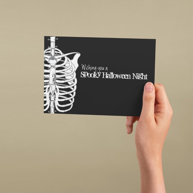 Spooky Skeleton Halloween Black and White Card (Spooky Halloween greeting card with skeleton illustration and gothic black background.)