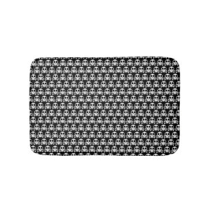 spooky skull on a black background bath mat