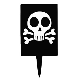 spooky skull on a black background cake topper