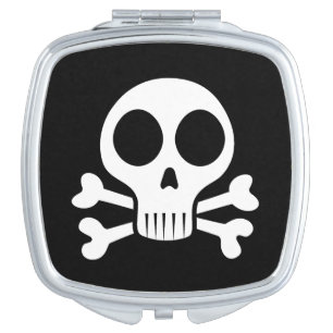 spooky skull on a black background compact mirror