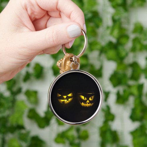 Spooky yellow on black eerie pumpkin face design k keychain