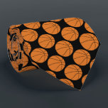 Sports Orange Basketball Pattern Novelty Tie<br><div class="desc">A pattern of orange basket balls on a black background covers this sports themed tie.  Perfect for basketball fans!</div>