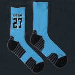 Sports Team Name Number Lt Blue Black Basketball Socks<br><div class="desc">Coordinate your team with this simple pair of sports socks by JessicaAmber! These high performance crew socks feature bold varsity-style lettering for your team name and team number, and a light blue and black color scheme. All colours and text are editable in the Personalise screen. Make a set for your...</div>