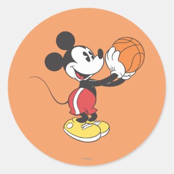 Sporty Mickey | Holding Basketball Classic Round Sticker by MickeyAndFriends at Zazzle