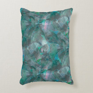 Spoted greenish cyan over unfinished wall plaster  accent pillow