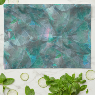 Spoted greenish cyan over unfinished wall plaster  kitchen towel