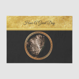 Spotted leopard looking at you with gold foil tissue paper