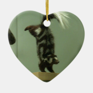 Spotted skunk; museum exhibit ceramic ornament