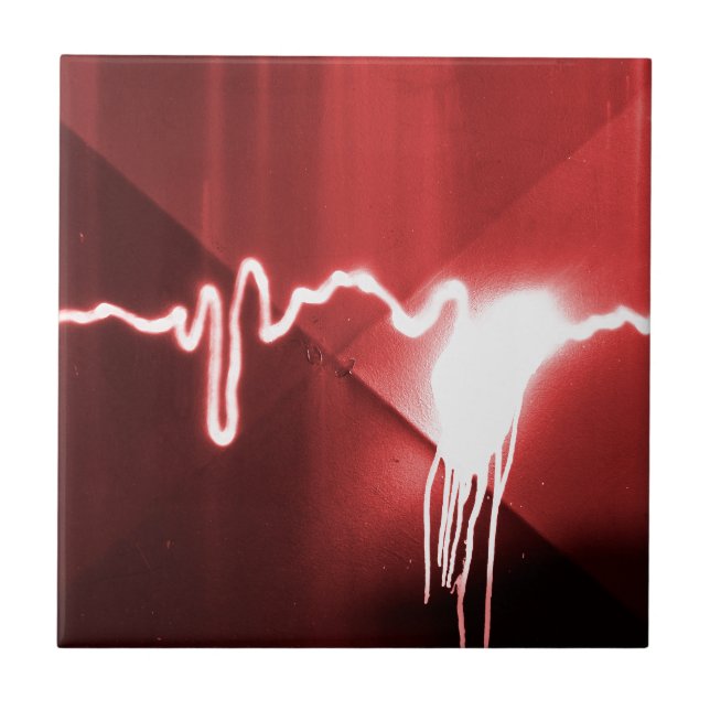 Sprayed graffiti on red metal tile (Front)