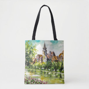 Spring in small city on the river tote bag
