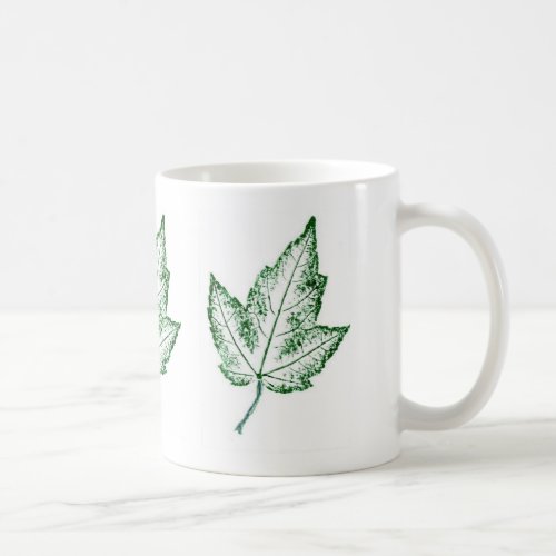 Spring maple leaf repeated three times in design  coffee mug