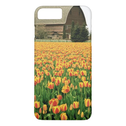 Spring tulips bloom in front of old barn iPhone 8 plus7 plus case