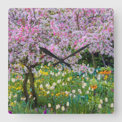 Springtime in Claude Monets garden Square Wall Clock