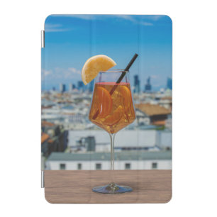 Spritz cocktail on a table with view of Milan iPad Mini Cover