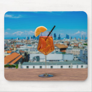 Spritz cocktail on a table with view of Milan Mouse Pad