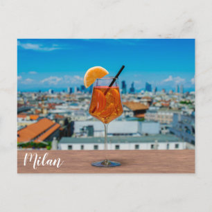 Spritz cocktail on a table with view of Milan Postcard