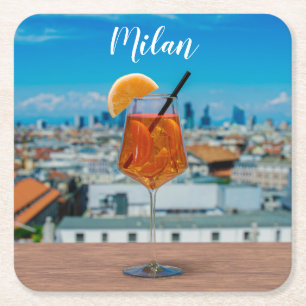 Spritz cocktail on a table with view of Milan Square Paper Coaster
