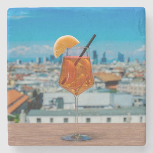 Spritz cocktail on a table with view of Milan Stone Coaster