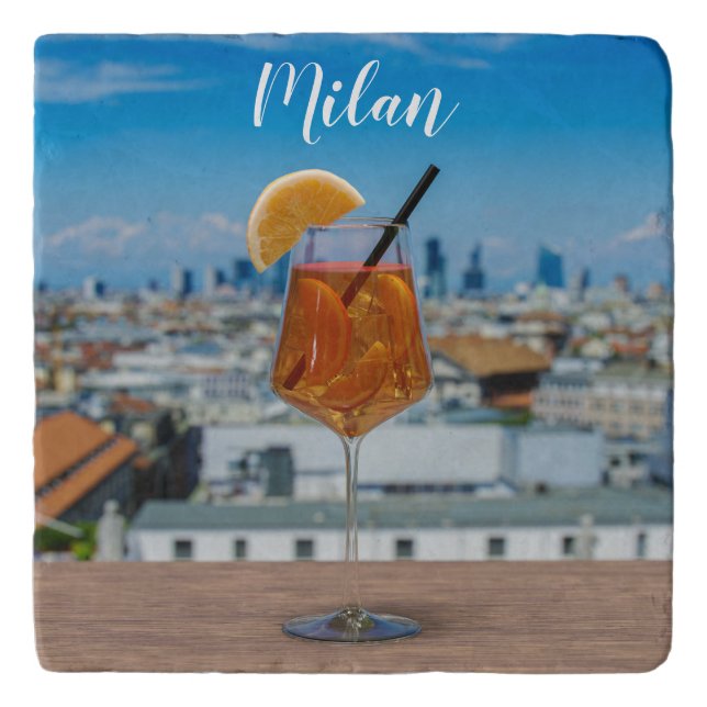 Spritz cocktail on a table with view of Milan Trivet (Front)