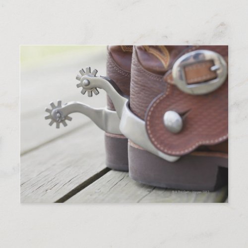 Spurs on cowboy boots postcard