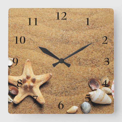 Square clock with a beach scene