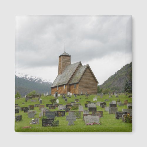 Square magnet stave church with graves in Norway