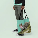 Squirrel Blowing a Bubblegum Bubble Animal Photo Tote Bag<br><div class="desc">Tote your stuff in style with this quirky but cute tote bag. It features a photo of a gray squirrel blowing a bubble with some pink bubblegum.</div>