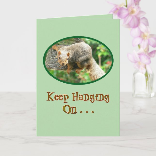 Squirrel Clinging to Birdfeeder, "Keep Hanging On. Card (Orchid)