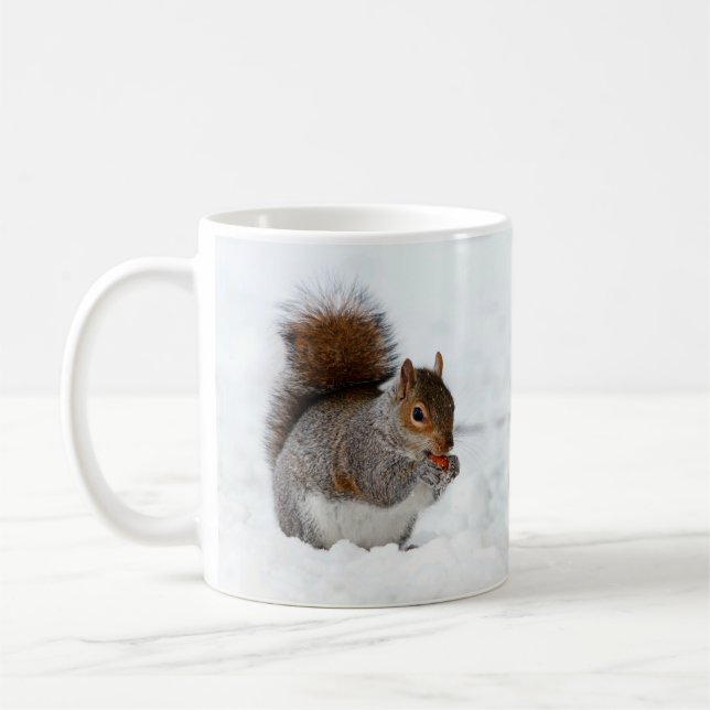 Squirrel in the Snow Eating a Red Berry Mug (Left)
