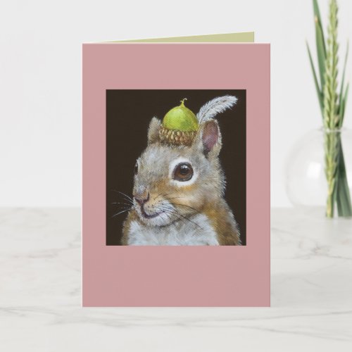 squirrel with acorn and feather hat on card