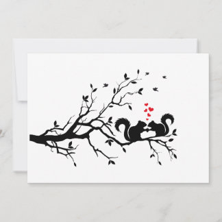 Squrrels with red hearts on tree branch