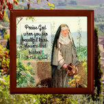 St Clare of Assisi Watering Flowers (M 065; Quote) Gift Box<br><div class="desc">Franciscan Spirituality has its origin in the life and thought of St. Francis of Assisi (1181/1182-1226), composer of the Canticle of the Sun. Among its principles are an emphasis on responsible stewardship for the environment and a deep belief in the interconnectedness of man and nature as reflections of God, the...</div>
