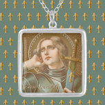 St. Joan of Arc (JM 28) Silver Plated Necklace<br><div class="desc">St. Joan of Arc, the “Maid of Orleans”, is patron saint of women who serve in the military. In this depiction, her military career is emphasized. St. Joan is clad in contemporary 15th-century plate armor and shoulders a sword in a scabbard ornamented with fleur di lis. The fleur di lis,...</div>